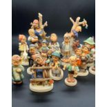 A selection of Goebel Hummel German porcelain figurines various dates and sizes (1948, 1975, 1938,