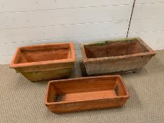 Three rectangular terracotta pots