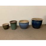 Four glazed plant pots, various sizes and colour (Largest H32cm Dia 39cm)