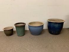 Four glazed plant pots, various sizes and colour (Largest H32cm Dia 39cm)