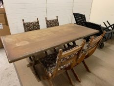 A Gothic style dining table with pierced trefoil ends with four X formed upholstered dining chairs