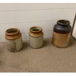 Three stone and glazed pots