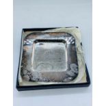 A Boxed commemorative silver Shell oil ashtray.