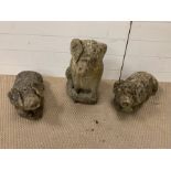 Three well weathered garden pigs