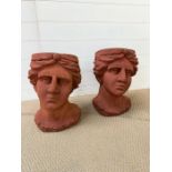 A pair of head themed plant pots (approx. H46cm)