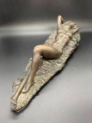 John Letts bronzed sculpture of a women reclining on a rock (L45cm)