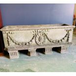 Re-pressed stone planter with crowns and swags on Doric column decorated feet (H35cm D35cm W122cm)