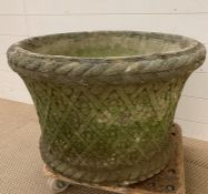 Large rope rimmed re-pressed stone pot with flower and lattice sides (H43cm Dia 62cm)