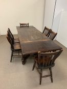 An Oak 18th Century Refectory Table with six 19th Century Elm chairs.( H90cm W256cm D80cm)