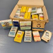 A box of vintage cigarette boxes