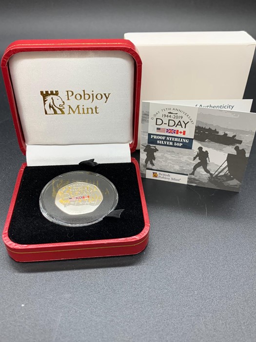 A Pobjoy Mint D-Day Proof Sterling Silver 50p.