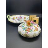 A Herend porcelain plate and lidded bowl with floral design.