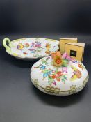 A Herend porcelain plate and lidded bowl with floral design.