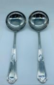 A Pair of Guy Degrenne 18-8 French Ladles