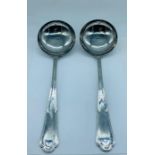 A Pair of Guy Degrenne 18-8 French Ladles