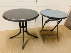 Two grey circular tables