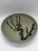 A Poh Chap Yeap (1927 - 2007) Earthenware Charger 31 cm in diameter and 4 cm deep