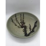 A Poh Chap Yeap (1927 - 2007) Earthenware Charger 31 cm in diameter and 4 cm deep