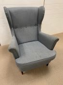 A grey modern wing back chair (H94cm D70cm W80cm)