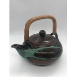 A Poh Chap Yeap (1927 - 2007) Pottery Teapot (H15cm)Condition Report There is a chip to the spout.