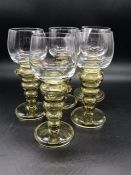 Four Moselle Wine Glasses plus one other.