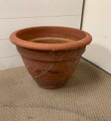 A terracotta plant pot (H30cm Dia 44cm)