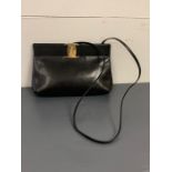 A Ladies Sabatone Ferragamo Black Leather Shoulder Bag