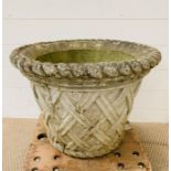 A medium rope rimmed re-pressed stone pot (H39cm Dia 53cm)