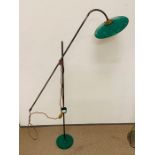 A Green enamel adjustable floor standing lamp.