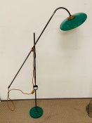 A Green enamel adjustable floor standing lamp.