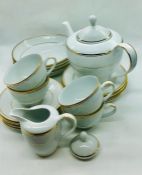 A tea service for four by Fairmount "8908 Infinity" to include, teapot, milk jug, sugar bowl (lid