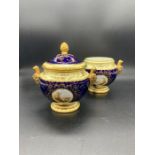 A pair of Coalport lidded pots