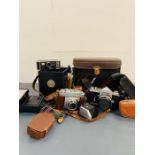 A selection of various cameras, Nikon, Zeiss Ikon light meters and flashes