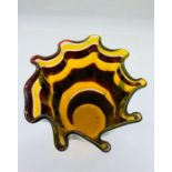 A wave rim vase of acid yellow and dark purple wave