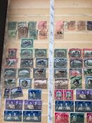 A worldwide stamp album to include South Georgia, South Africa, Southern Rhodesia, Sudan,