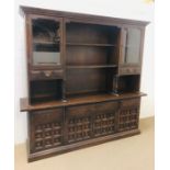 A large dark oak dresser/display cupboard by younger Furniture, The Toledo Range (H200cm D48cm