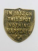 A brass plaque "In 1832 on this spot nothing happened"