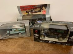 Three boxed model cars and vans AF