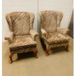 A pair of Park Knoll wing back chairs