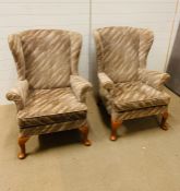 A pair of Park Knoll wing back chairs