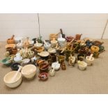 A large collection of pestle and mortars