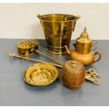 A selection of brass items including solid brass buckets and small enamel lidded barrel