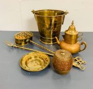 A selection of brass items including solid brass buckets and small enamel lidded barrel