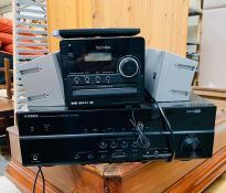 A Yamaha corporation amp model no: RX-V373 and a Technika MC1101PDR