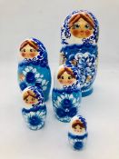 A Russian doll set consisting of five dolls