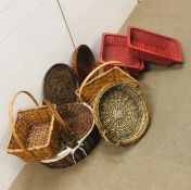 A selection of nine items of basket ware