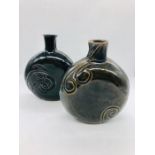 A pair of Studio Pottery vases signed to the base "A" standing approx. 18cm tall