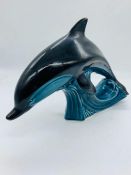 A Poole pottery dolphin