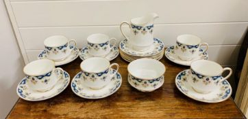 A Paragon tea set comprising six cups, saucers, sideplates, sugar boql and milk jug