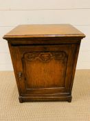 An oak pot cupboard